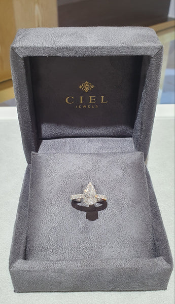 Pear Diamond Petal Basket Solitaire Ring